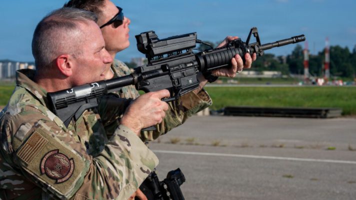 U.S. Air Force Lt. Col. Shane Watts, 51st Security Forces Squadron commander, aims a rifle equipped with a Smart Shooter SMASH optic during Exercise Dragon Flight at Osan Air Base, Republic of Korea, Aug. 6, 2026. The Smart Shooter rifle is equipped with a Smash 2000 optic designed to make rifles more accurate and lethal for drones and rotary wing aircraft to effectively take out a target in a single shot. (U.S. Air Force photo by Senior Airman Rome Bowermaster)